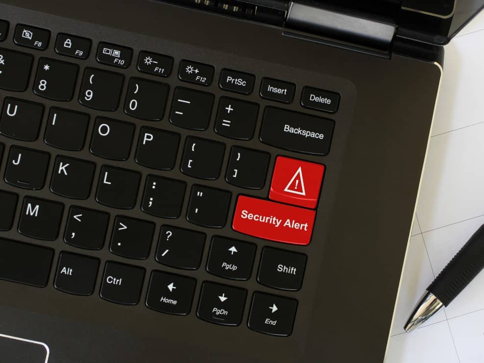 security alert button on keyboard - cybersecurity during international conflict with russia and ukraine