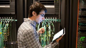 IT specialist working in a server room
